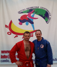 Coach Patrick Kennedy in blue with Coach Igor Kurinnoy in Red