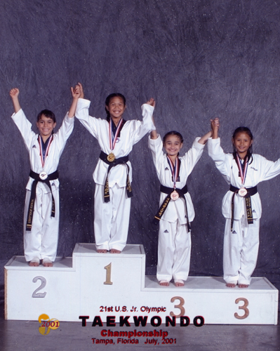 Master Instructor Shaina Kennedy (Far Right) wins the Bronze Medal in sparring at the Junior Olympics!!!